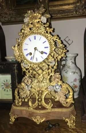 French Multicolored Floral Motif Gold and Porcelain Shelf Clock (c. 1850)
